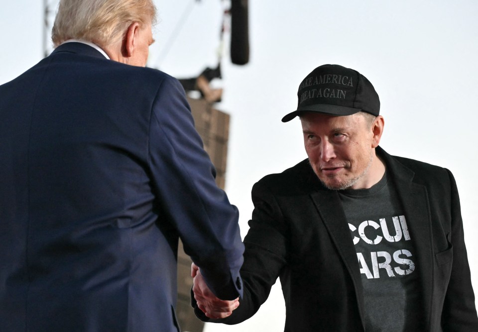 Musk (R) joins Trump during a campaign rally at the site of his first assassination attempt in Butler, Pennsylvania