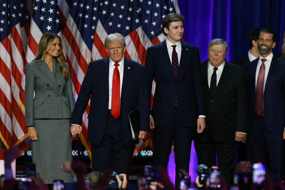 Trump arrives to speak with former First Lady Melania Trump and Barron Trump during an election night event at the Palm Beach Convention Center