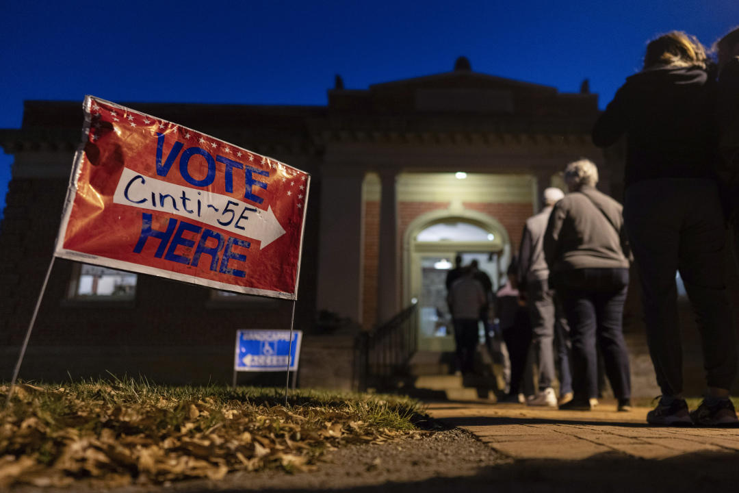 Voters line up to enter their polling place at the Cincinnati Observatory on election day, Tuesday, Nov. 5, 2024, in Cincinnati. (AP Photo/Carolyn Kaster)