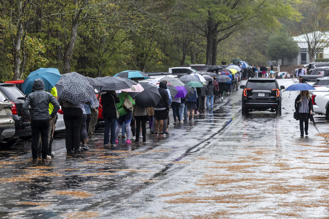 Voters line up to cast their ballots at The Church at Brook Hills on Election Day, Tuesday, Nov. 5, 2024, in Birmingham, Ala. (AP Photo/Vasha Hunt)