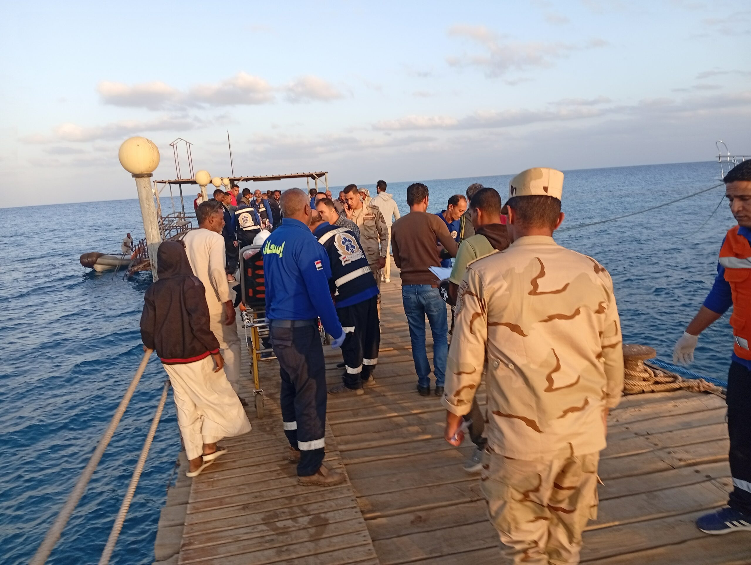 Medics waiting for survivors as the rescue team scoured the water