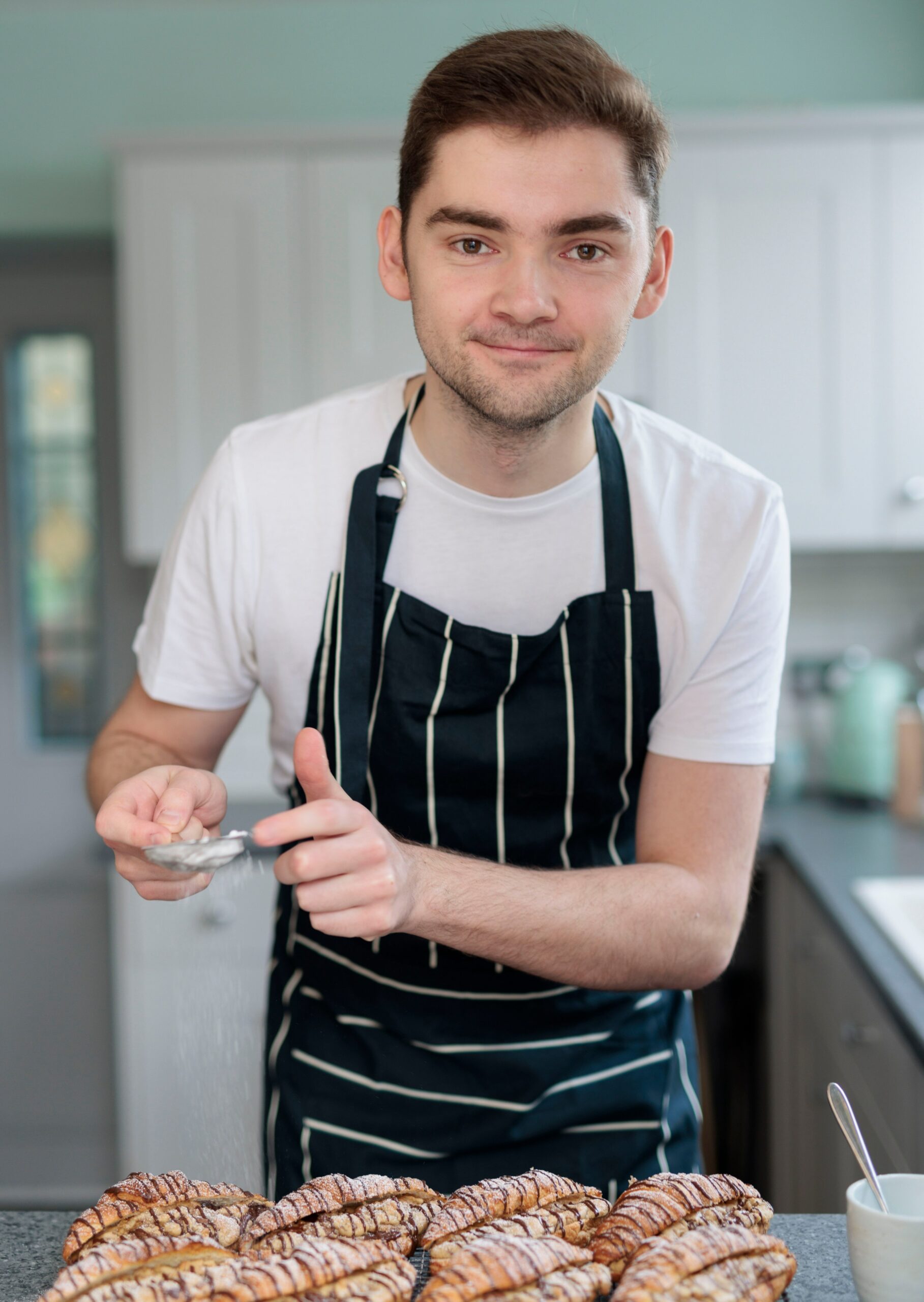 Henry Bird, a former Bake Off contestant, showing off his ‘crookie’ recipe