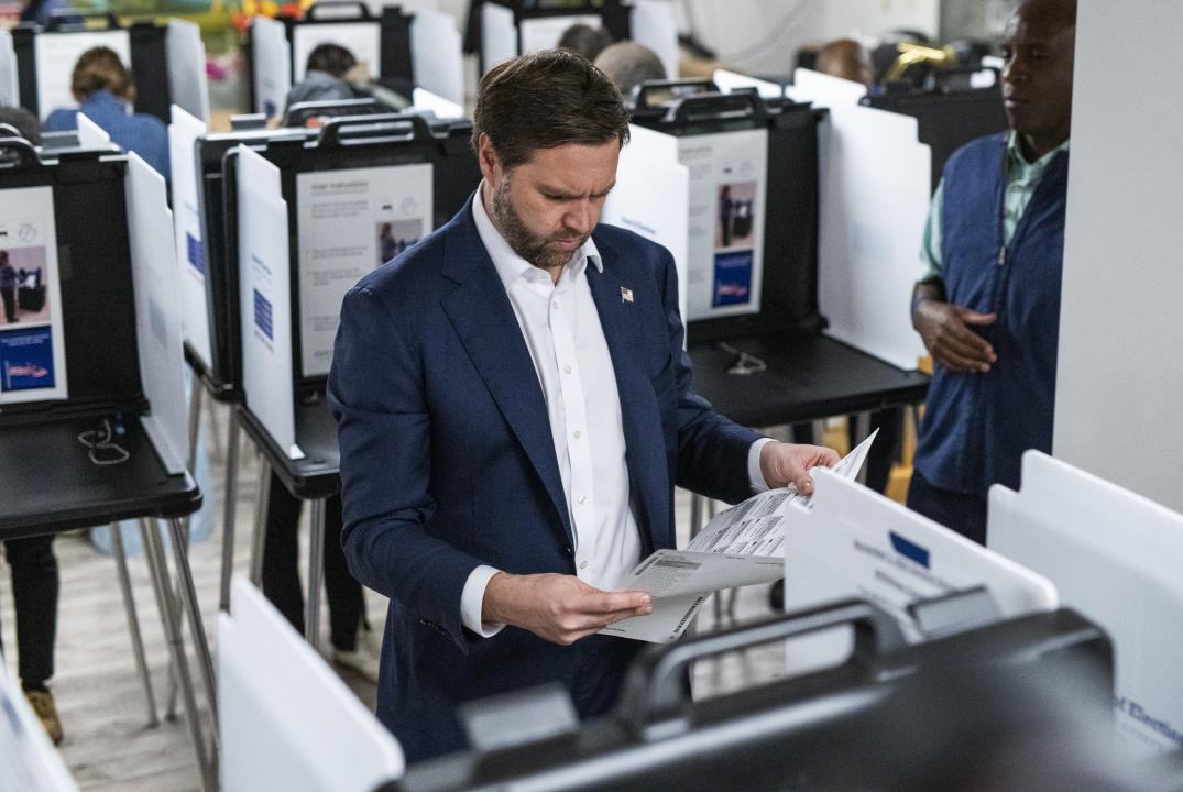 CINCINNATI, OHIO - NOVEMBER 5: Republican nominee for vice president U.S. Sen. JD Vance (R-OH) looks over his ballot at a polling place on November 5, 2024 in Cincinnati, Ohio. Americans cast their ballots today in the presidential race between Republican nominee former President Donald Trump and Democratic nominee Vice President Kamala Harris, as well as multiple state elections that will determine the balance of power in Congress. (Photo by Stephen Maturen/Getty Images)