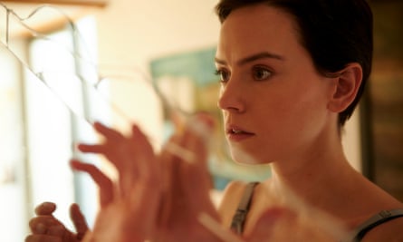 Daisy Ridley looks in a broken Mirror in Magpie.