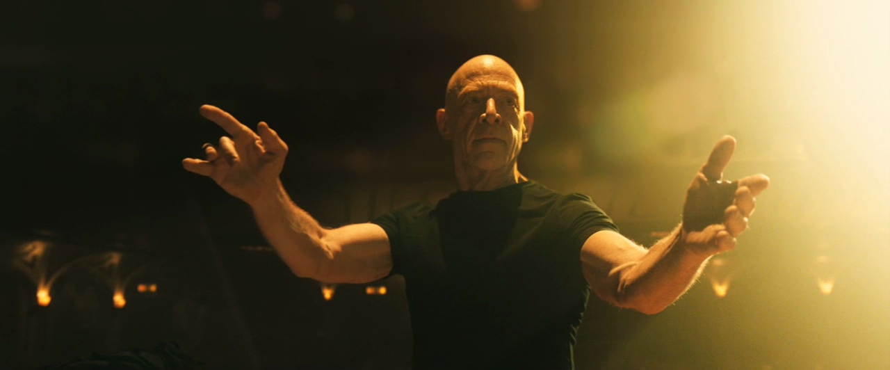 J. K. Simmons conducting an orchestra in Whiplash.