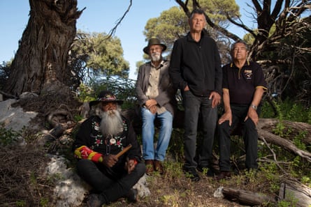 L-R Herbert Bropho, Farley Garlett, Richard Walley, Neville Collard sit under trees.