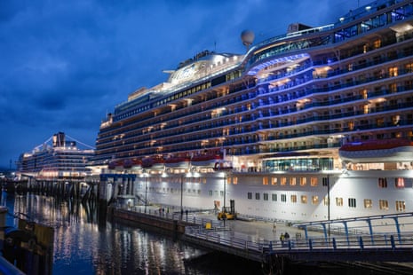 At night, and illuminated, cruise ships docked in Juneau in September.