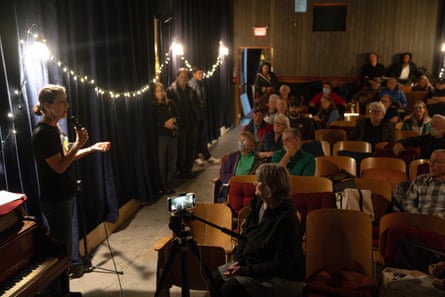 Karla Hart, seated in front, at a town hall discussion in Juneau, Alaska.