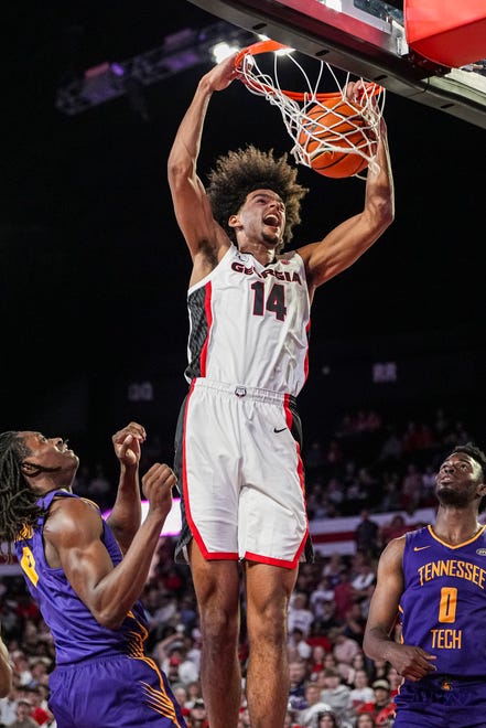 Nov 4, 2024; Athens, Georgia, USA; Georgia Bulldogs forward Asa Newell (14) dunks against the Tennessee Tech Golden Eagles at Stegeman Coliseum. Mandatory Credit: Dale Zanine-Imagn Images