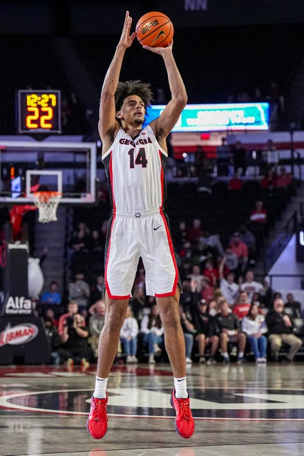 Nov 4, 2024; Athens, Georgia, USA; Georgia Bulldogs forward Asa Newell (14) shoots against the Tennessee Tech Golden Eagles at Stegeman Coliseum. Mandatory Credit: Dale Zanine-Imagn Images