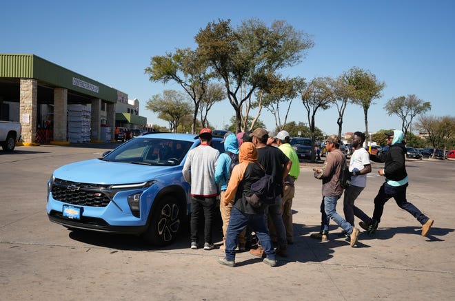 Undocumented immigrants try to get day labor jobs at a Home Depot in South Austin Wednesday November 6, 2024.