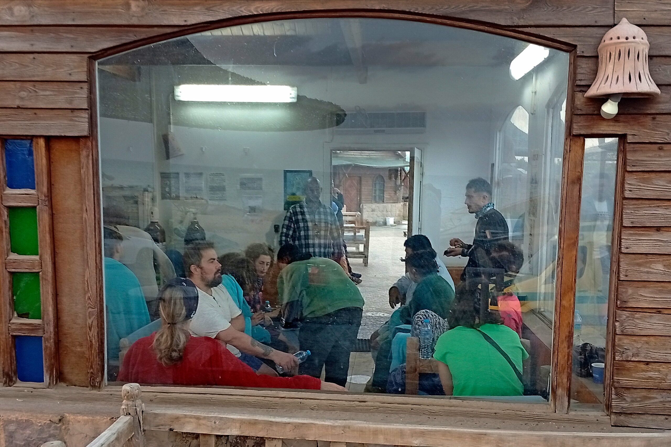 Survivors rest at a coffee shop in Marsa Alam, Egypt, Monday, 25 November 2024