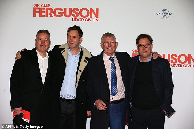 His sons Darren (L), Mark (second left) and Jason (right), are listed as persons with significant control of the business