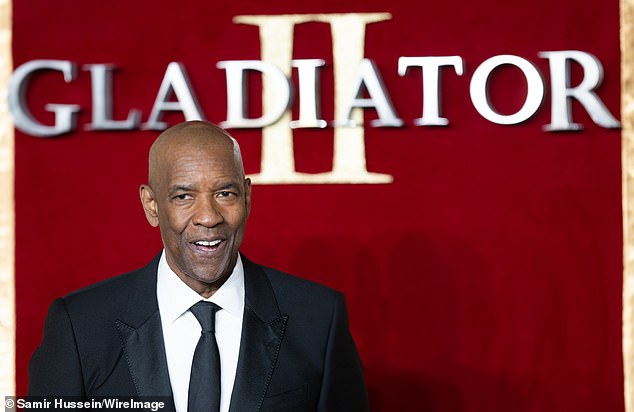 Denzel Washington revealed one of the Gladiator II scenes that wound up on the cutting room floor ahead of the release of Ridley Scott's $310M-budget historical epic (pictured Wednesday)