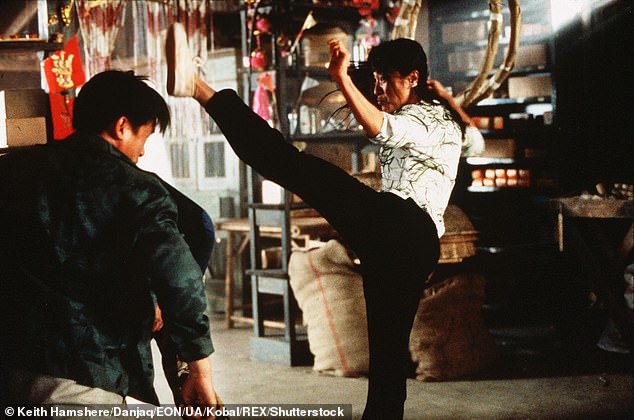 Ms Yeoh (pictured on set) did a lot of her own stunts on the set of Tomorrow Never Dies