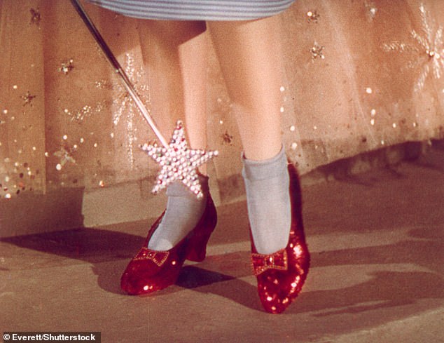 In the original Wizard of Oz movie inspired by the 1900 book by L. Frank Baum - Dorothy's slippers are famously ruby coloured