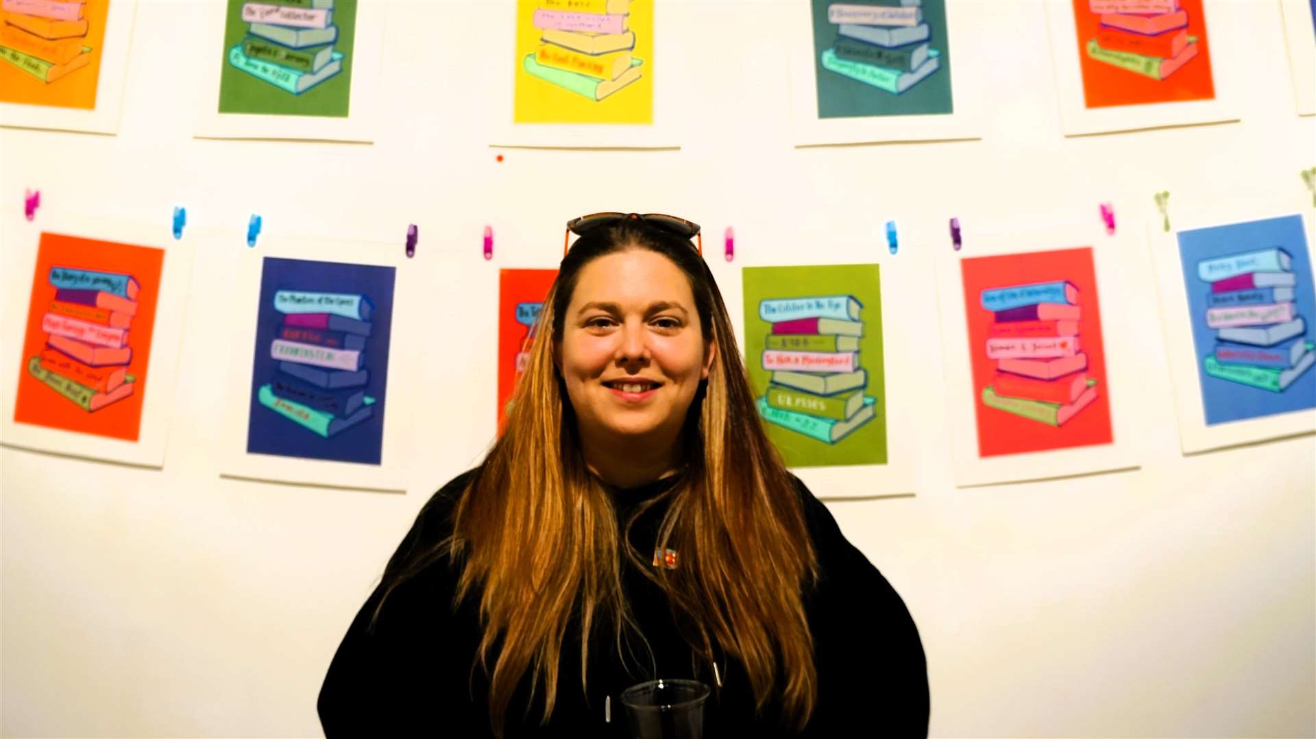 Katie with a colourful array of book-themed prints she created for the new show in Thurso. Picture: DGS