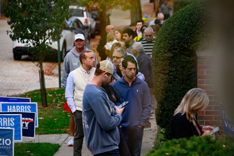 Voters wait in line at the polling site at Oakmont United Methodist Church in Oakmont, Pennsylvania, on Tuesday morning