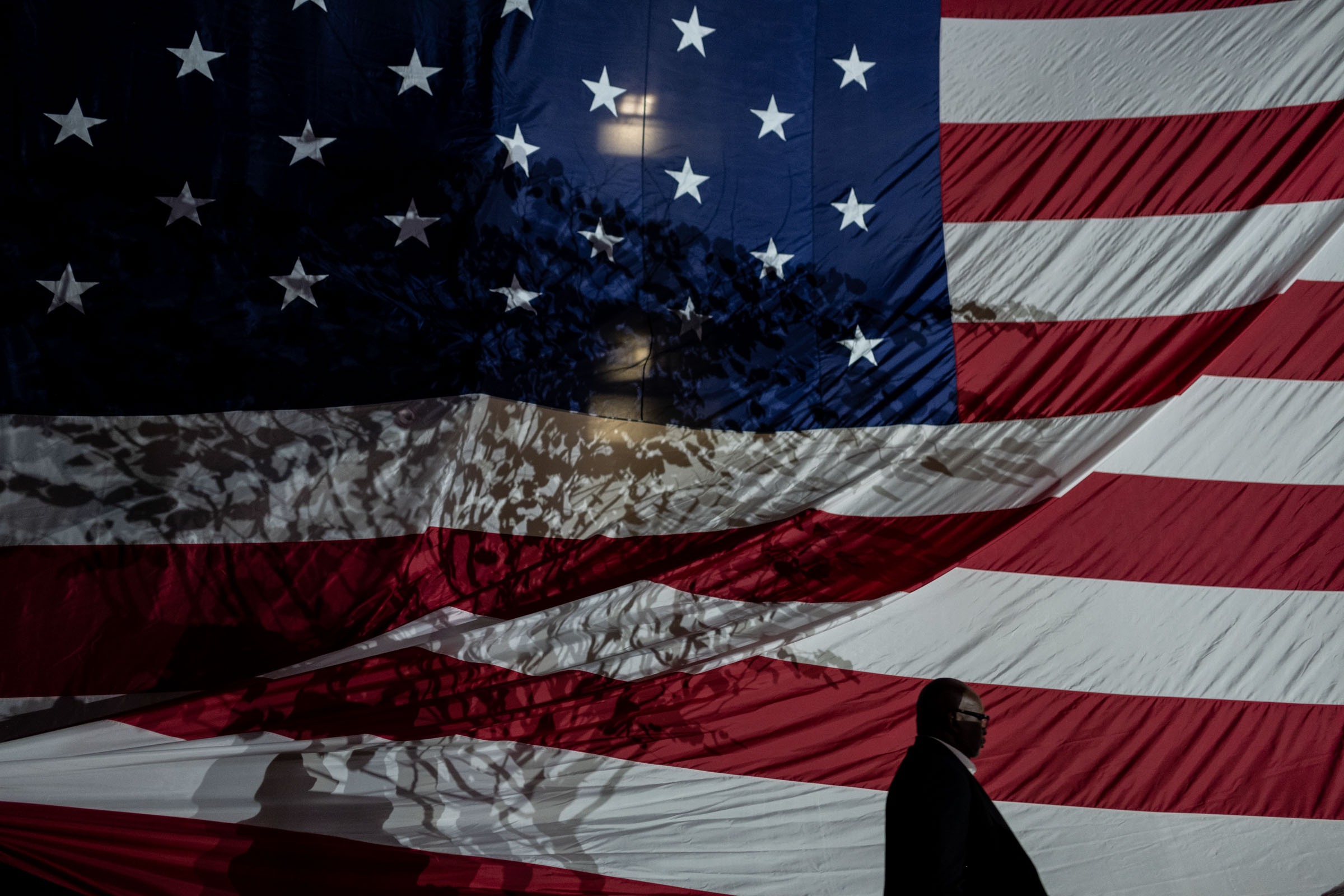 11/5/2024, Howard University, Washington, D.C. An American flag is raised at the Harris election night watch party at Howard University in Washington, D.C. on Nov. 5, 2024. Gabriella Demczuk / TIME