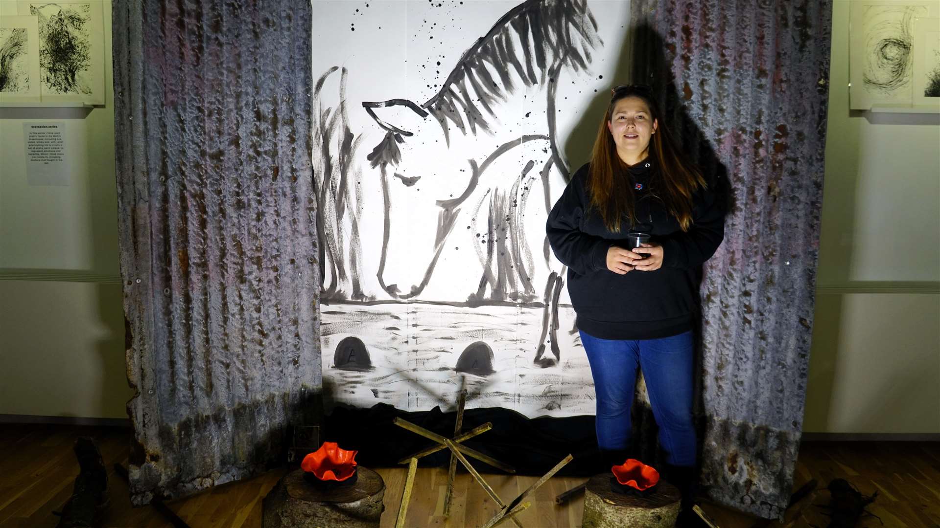 Katie beside the War Horse centrepiece she created for her show in Thurso. Picture: DGS