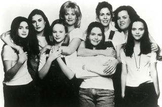 both the teen and adult cast of Now and then pose together