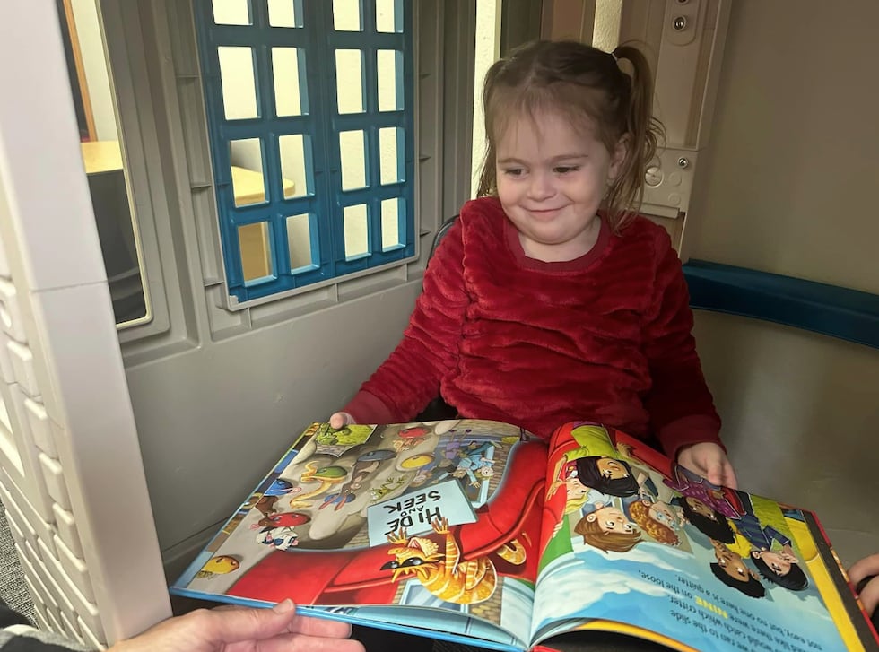 2-year-old Audrey Zevenbergen of Rock Valley, loved to visit the old Rock Valley Library. She...