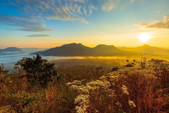 Phu Thok Chiang Khan scenery, Thailand,Sea of Mist with Light of the morning above Mountains from viewpoint at Phu Thok, Chiang Khan, Loei, Thailand.