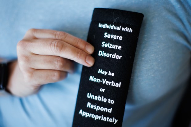 Andrea Miller's seat belt sleeve notification to inform bystanders and emergency personnel about her seizure disorder. Miller is diagnosed with a rare form of epilepsy called Lennox-Gastaut Syndrome. (Dai Sugano/Bay Area News Group)