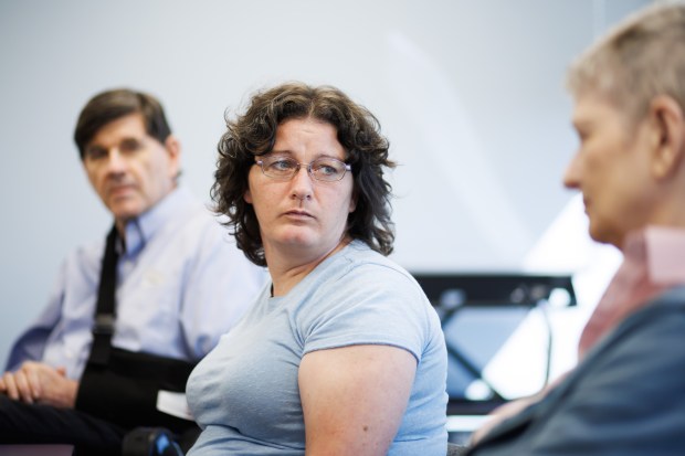 Andrea Miller listens to her mother, Cathi See-Miller, as she describes one of the times Andrea had a seizure, during an interview on Oct. 21, 2024, in San Jose, Calif. (Dai Sugano/Bay Area News Group)