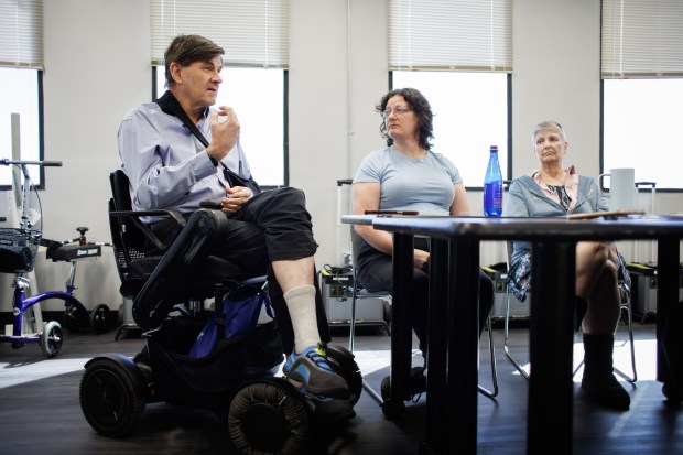 Andrea Miller's father, Greg Miller, talks about his daughter's rare form of epilepsy called Lennox-Gastaut Syndrome during an interview at the Silicon Valley Independent Living office in San Jose, Calif., on Oct. 21, 2024. Greg, who uses a wheelchair, has multiple sclerosis and spinal cord injuries. (Dai Sugano/Bay Area News Group)