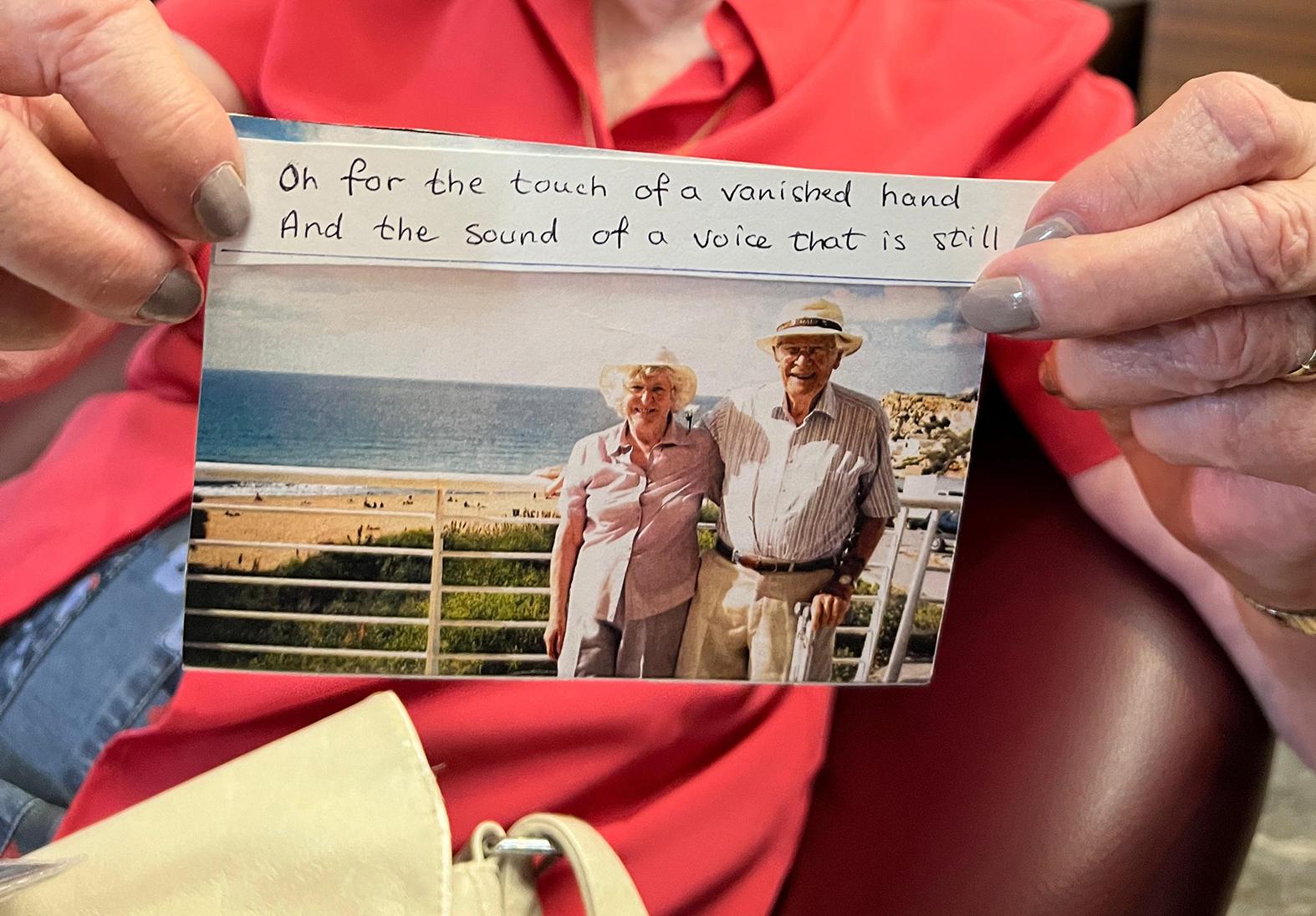 A photograph of Ruth Burton and her late husband Alexander Burton in Golden Bay with a Tennyson quote.