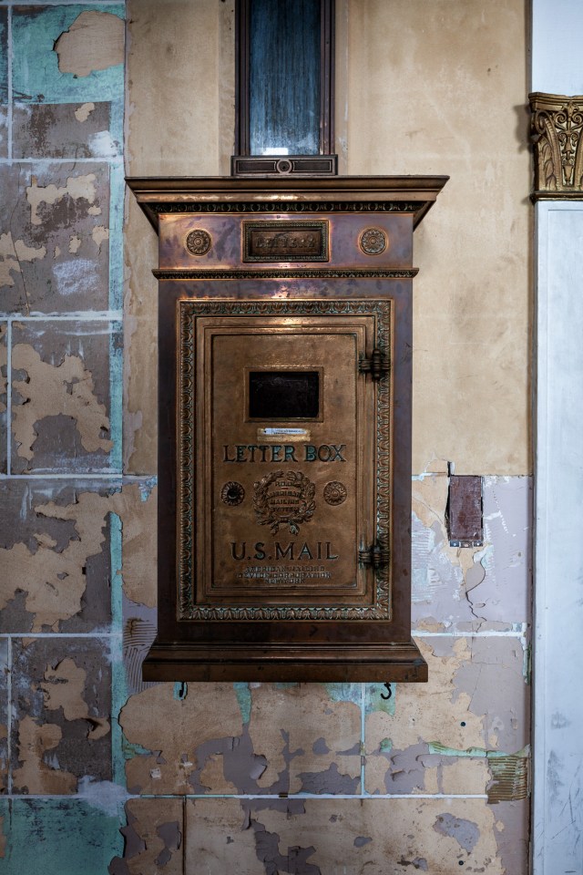 An old letter box remains at the site