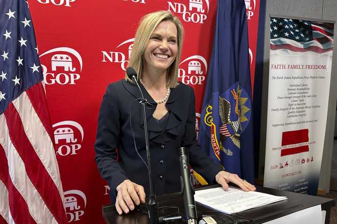 North Dakota Republican Public Service Commissioner Julie Fedorchak steps up to a lectern to announce her U.S. House candidacy at Republican Party headquarters in Bismarck, N.D., Thursday, Feb. 15, 2024. Fedorchak has served on the state&apos;s Public Service Commission since 2013. She is the third Republican to announce a campaign for North Dakota&apos;s single House seat. Republican Rep. Kelly Armstrong, first elected in 2018, is running for governor, creating an open race for the seat. (AP Photo/Jack Dura)