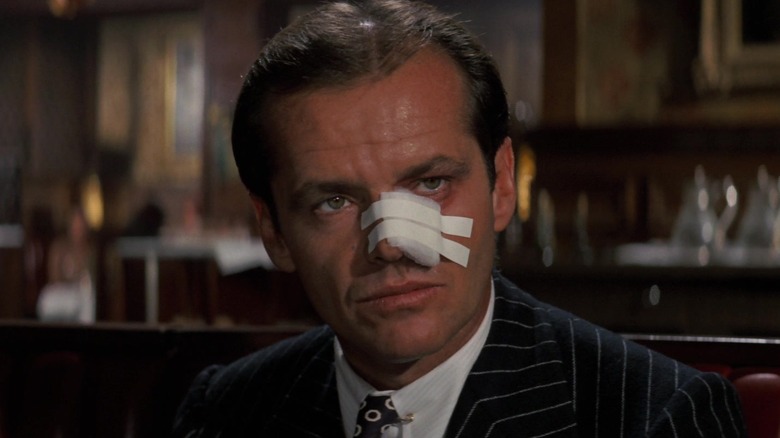 Jake Gittes with his nose bandaged in Chinatown (1974)