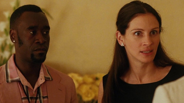 Don Cheadle as Basher and Julia Roberts as Tess in a tense moment in Ocean's Twelve