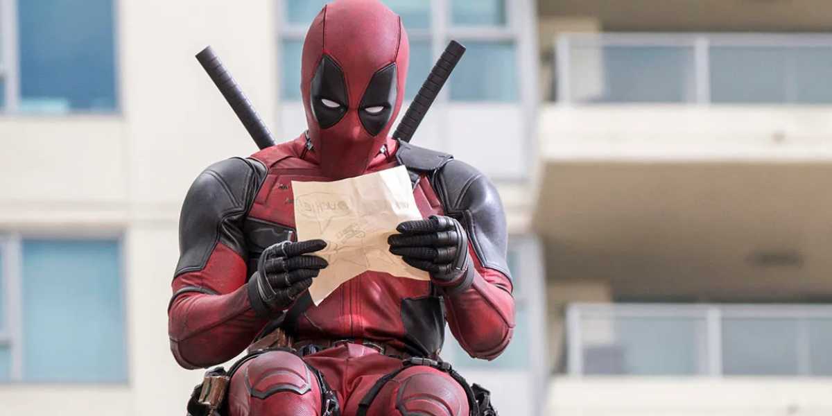 Deadpool (Ryan Reynolds) reading a letter