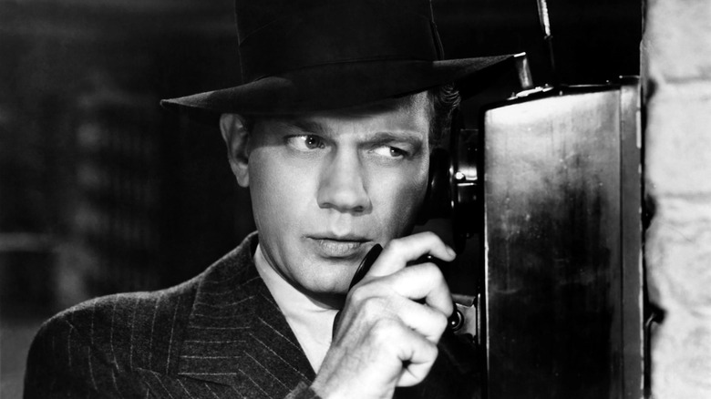 Joseph Cotten makes a phone call in Shadow of a Doubt