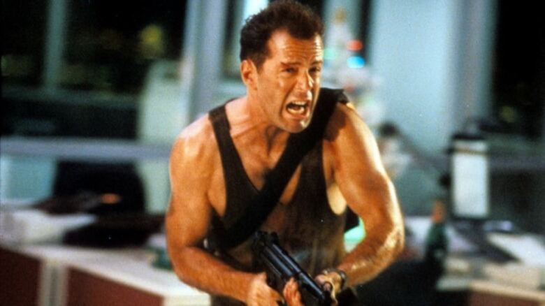 Bruce Willis has a machine gun in Die Hard