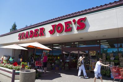 Fair Oaks, California, USA - July 23, 2011: Shoppers going in and out of Trader Joe&rsquo;s grocery store on a sunny summer day. Trader Joe&rsquo;s is a privately held chain of specialty grocery stores .The first Trader Joe&rsquo;s store opened in Pasadena, California in 1967 and today there are over 360 stores in 29 states.