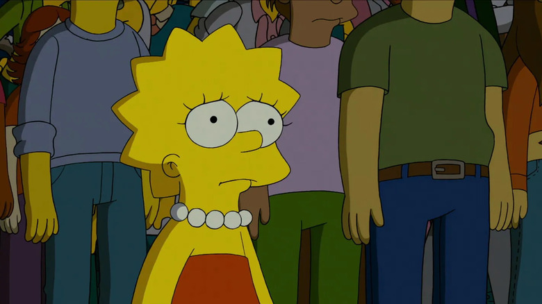 Lisa Simpson in a crowd, looking concerned