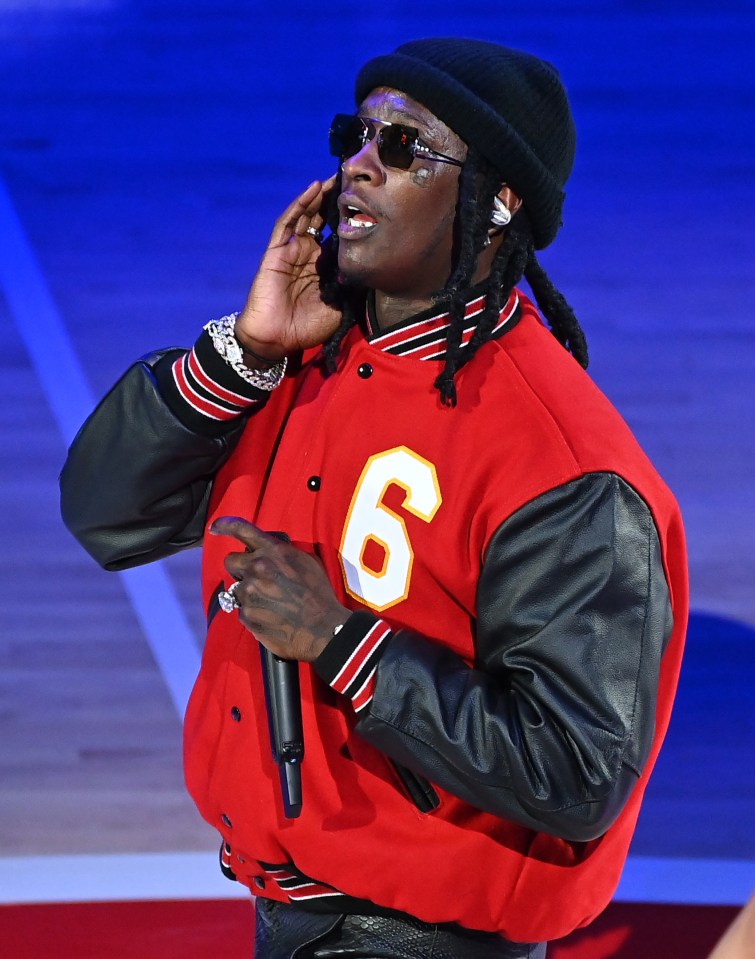 Young Thug performs at halftime during the Boston Celtics v Atlanta Hawks game at State Farm Arena on November 17, 2021