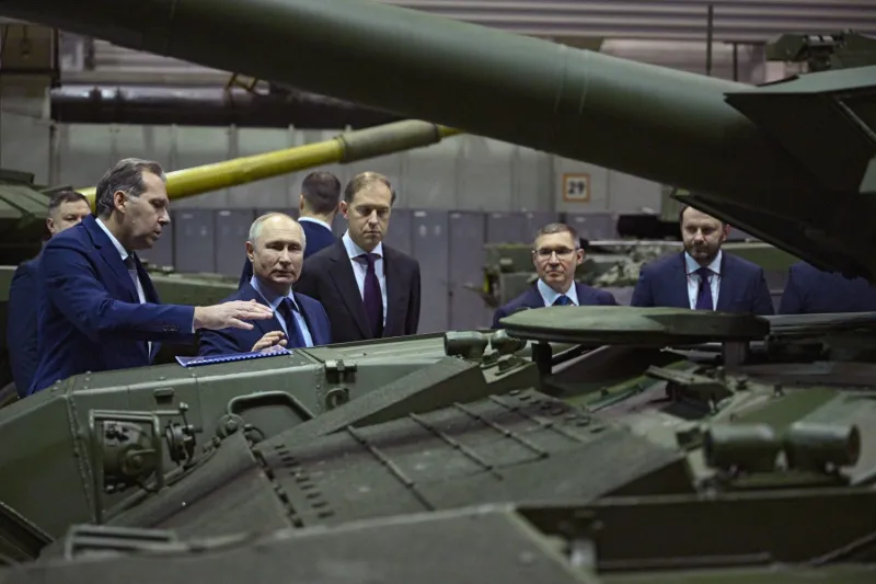 Putin visits Russian tank factory