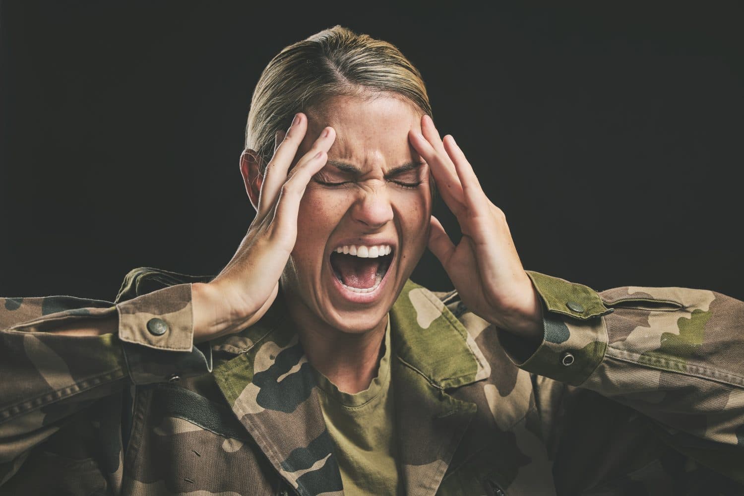 Ptsd, war and mental health with woman soldier suffering from trauma and flashback in a dark studio, stress and anxiety. Psychology, depression and military survivor experience paranoid psychosis