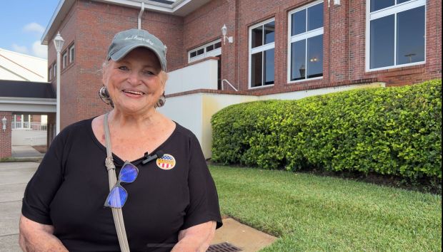 Cathy Lyter-Iooss votes at CrossLife Church in Oviedo with her husband, James Iooss. The couple are frequent voters who intended to vote early, but ended up voting on Tuesday morning hoping to avoid long lines. (Makayla Gray/Special to the Orlando Sentinel)