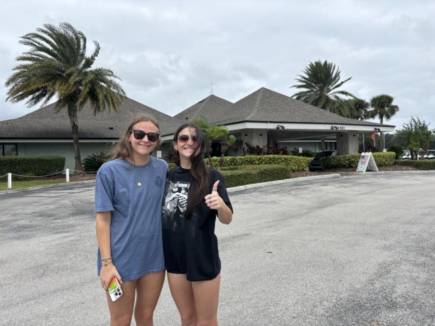 UCF students Ashley Hence, left, and Maya Delucca walk out of Orange County Precinct 540 at Fairways Country Club in Orlando Tuesday, Nov. 5, 2024. (Kendal Asbury/Special to the Orlando Sentinel)