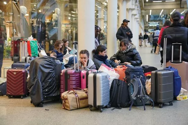 Passengers at St Pancras International station, London