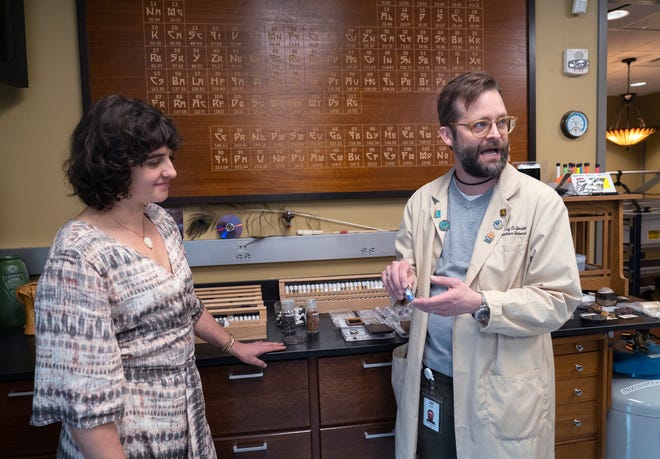 Clowes Conservator of Paintings Roxy Sperber, left, and Senior Conservation Scientist Greg Smith look at Smith’s collection of pigments, in his analytical lab Tuesday, Dec. 10, 2024 at the Indianapolis Museum of Art at Newfields.