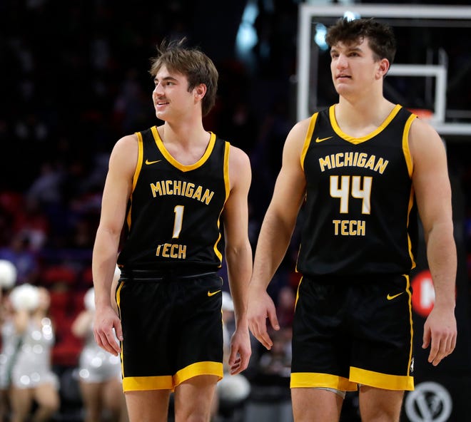 Michigan Tech's Marcus Tomashek (1) smiles during a game against University of Wisconsin-Green Bay on Dec. 18, 2024, at the Resch Center in Ashwaubenon, Wis.