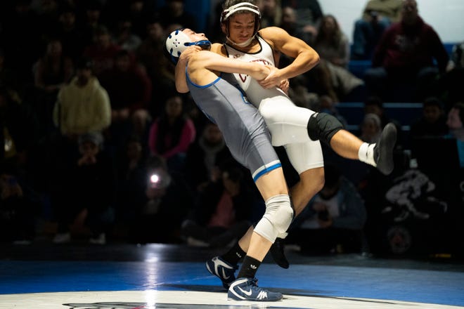 Dec 20, 2024; Wayne, NJ, USA; Clifton wrestling at Passaic Tech. (Left) Passaic Tech’s Muhammad Abuhadba and Clifton’s Jandell Borrero in their 120 pound match.