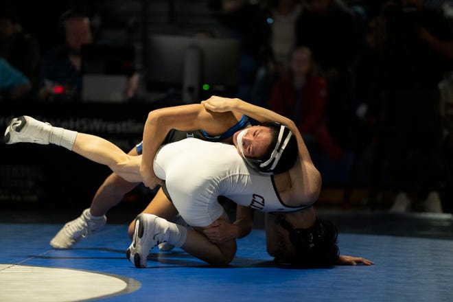 Dec 20, 2024; Wayne, NJ, USA; Clifton wrestling at Passaic Tech. (Left) Passaic Tech’s Nicholas Nguyen and Clifton’s Jayson Nguyen in their 106 pound match.